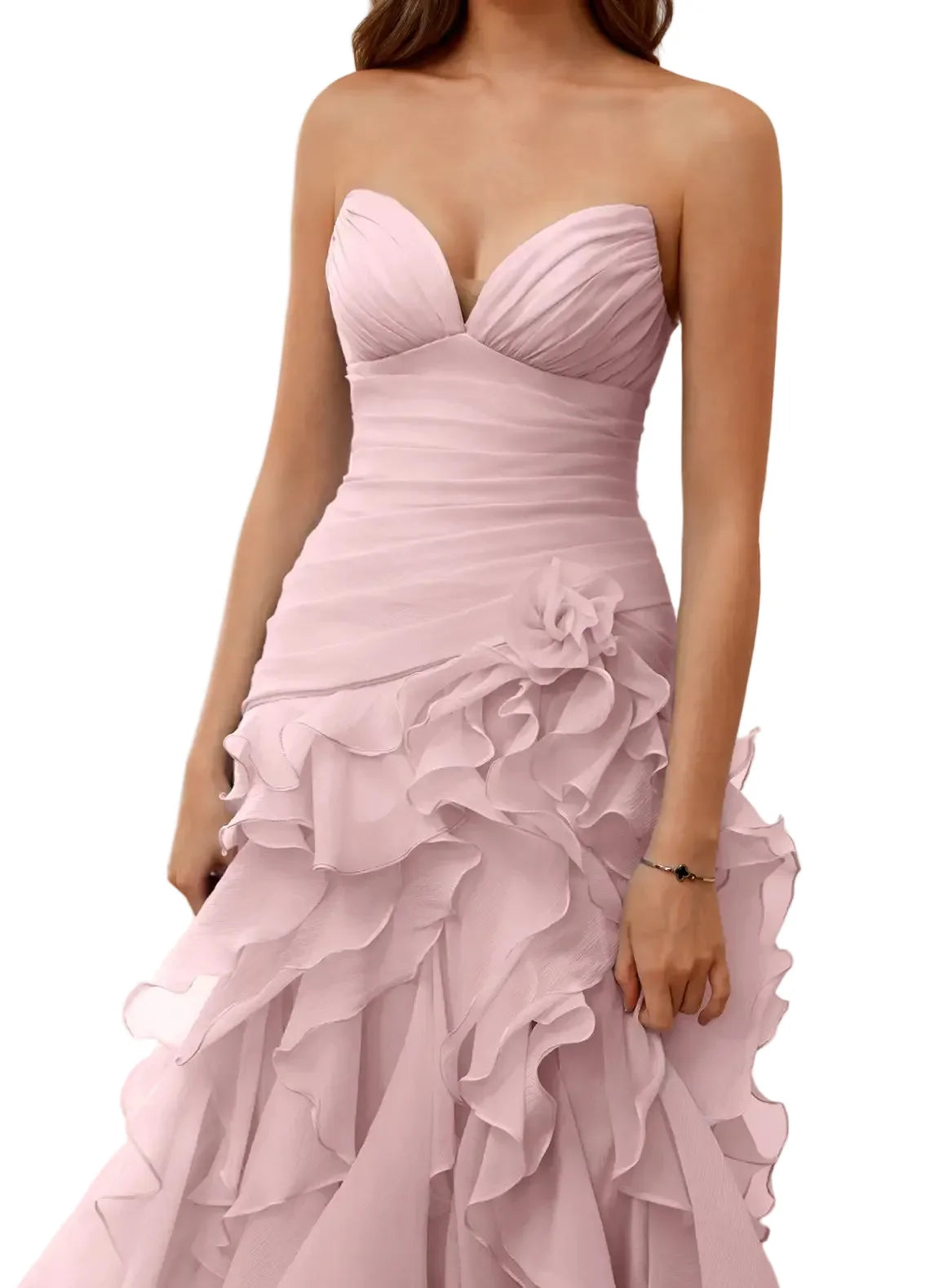 Pink strapless gown with ruffled layers on a neutral background