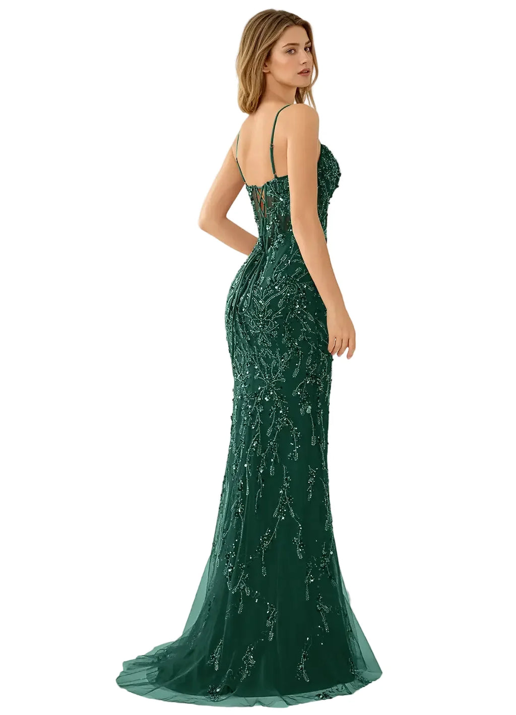 Green evening gown with sequin details on a white background