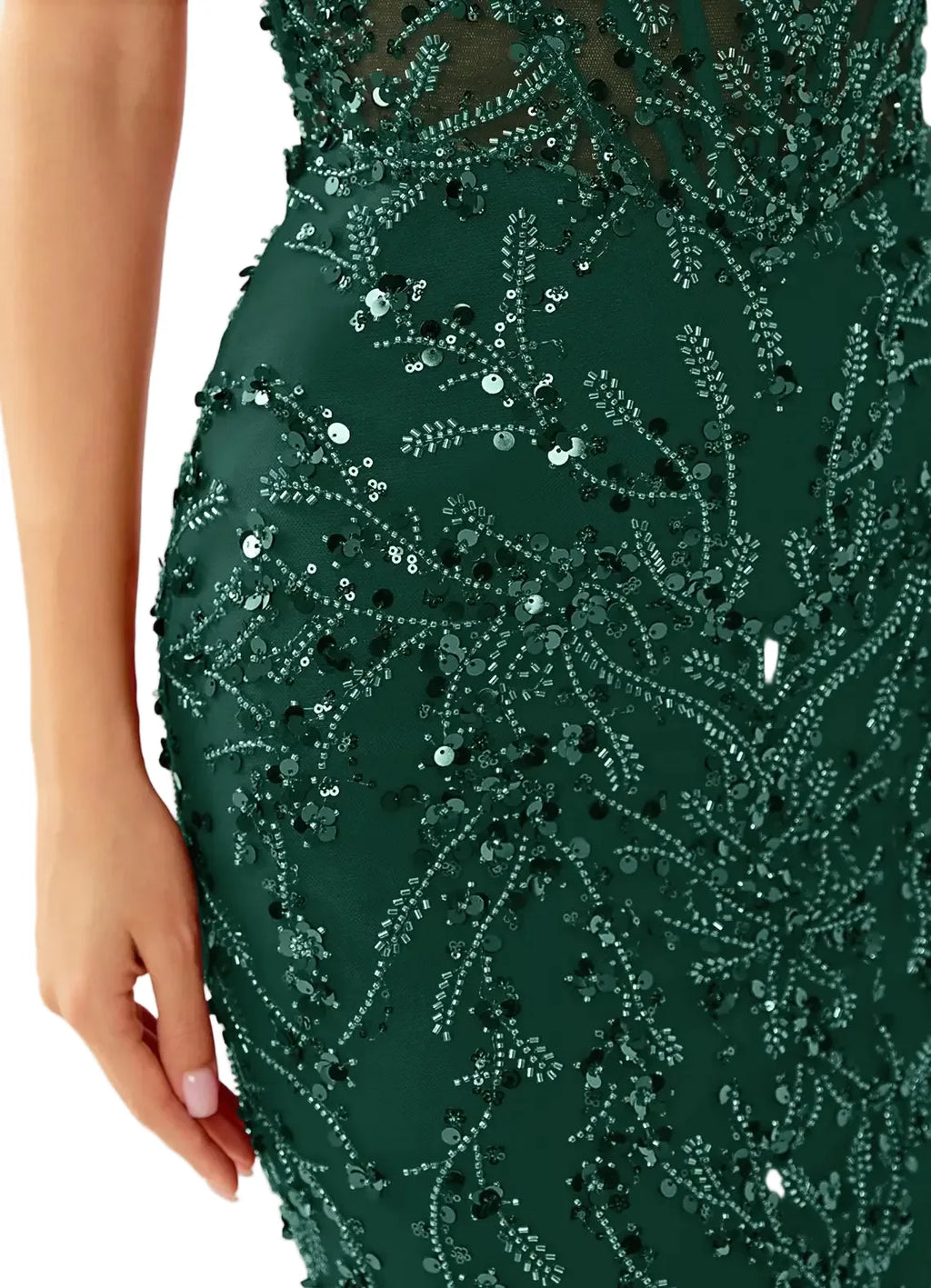 Green sequin dress with intricate detailing on a neutral background