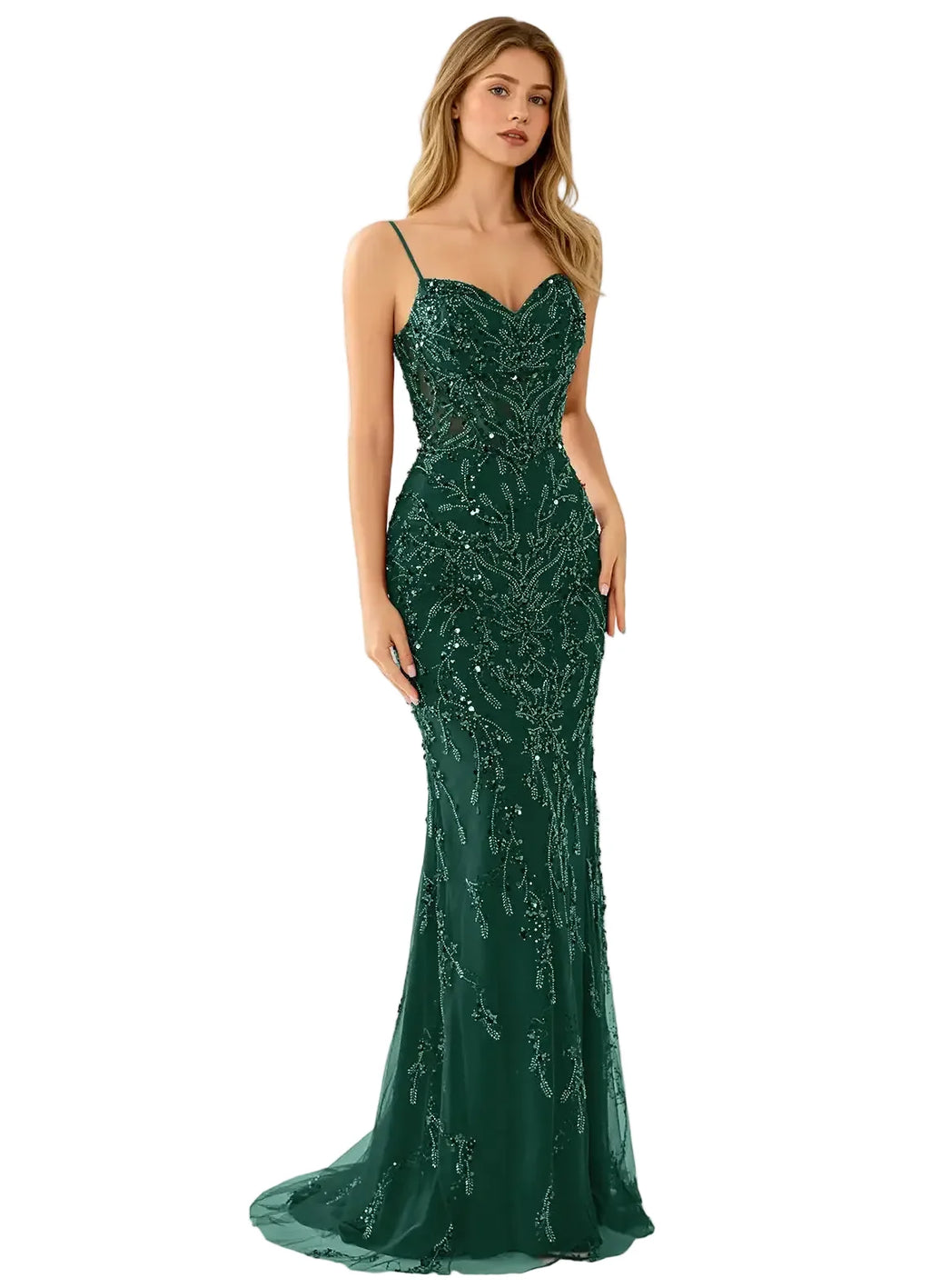 Woman wearing a green evening gown on a white background